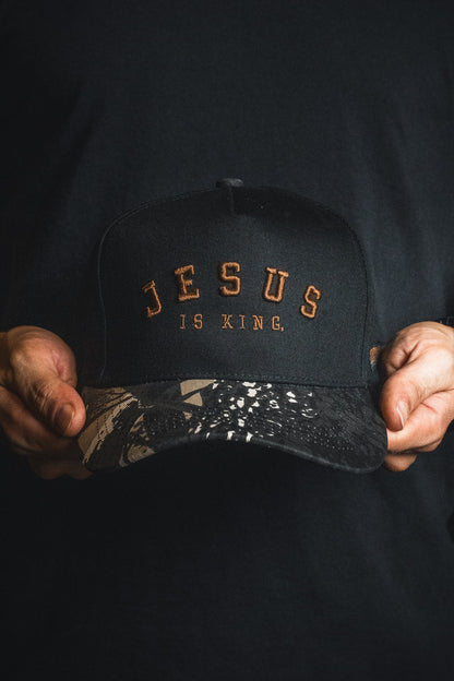 Jesus is King - Black and Darkwood Camo Snapback