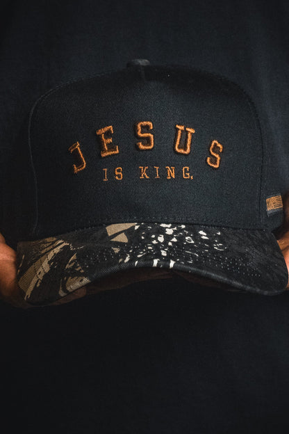 Jesus is King - Black and Darkwood Camo Snapback